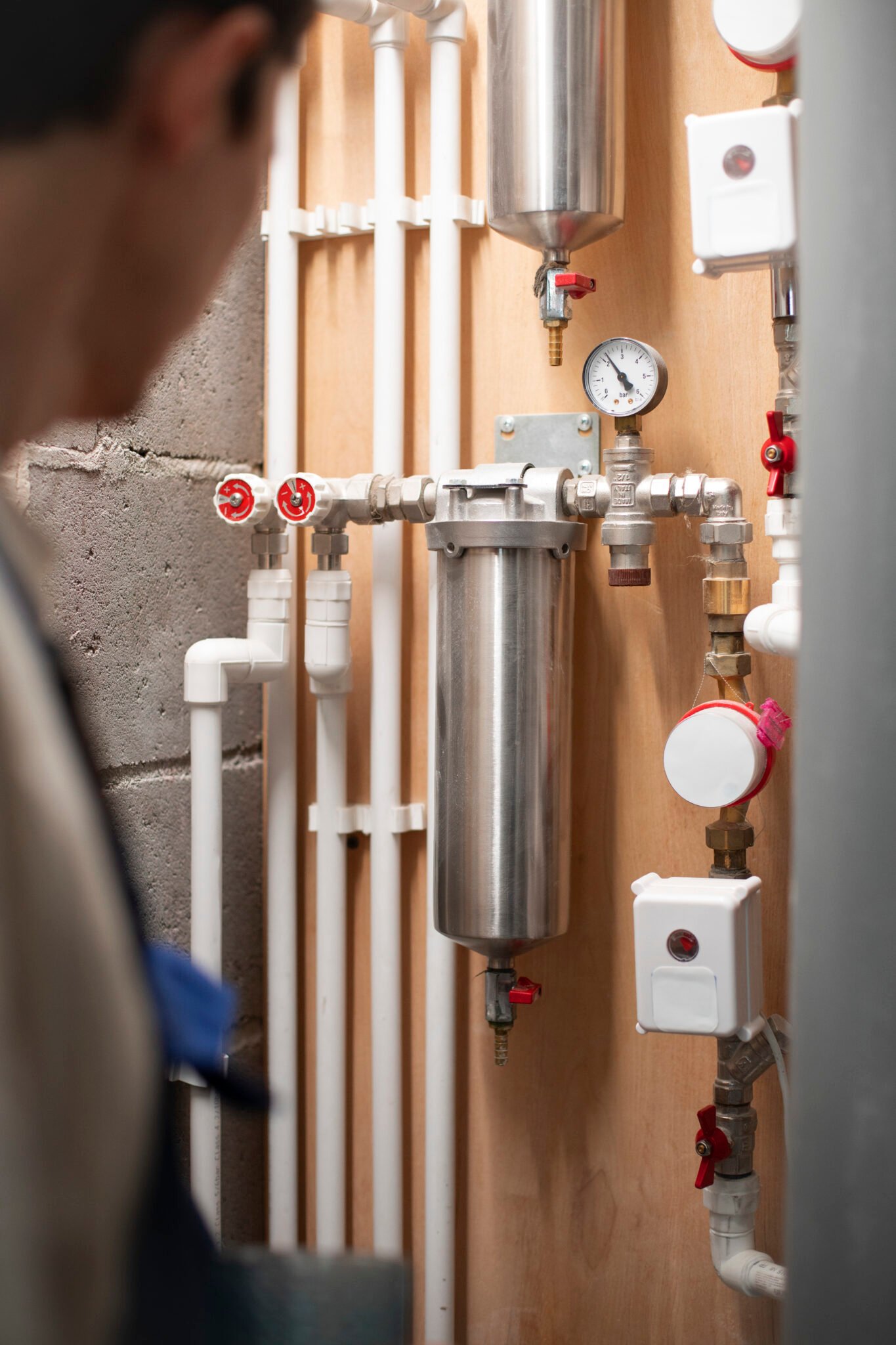 Conway Properties Group engineer carrying out plumbing work